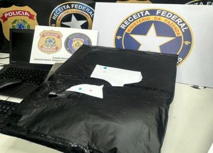 passageira-e-presa-durante-escala-em-confins;-3,5-kg-de-cocaina-estavam-escondidos-em-fundo-falso-de-mala